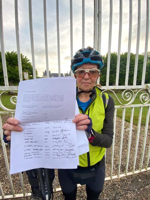 Dr Heather Lambert with a MOU between the NHS and WHO, "endorsed" by our riders