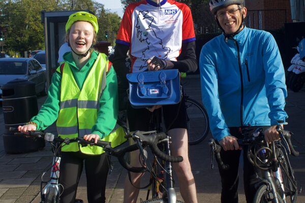 Diarmid poses with GOSH's Young People's Forum representatives Rose and Toby